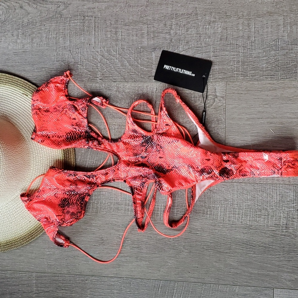 NWT Pretty Little Things Monokini. Bright orange dragonskin. Size 2